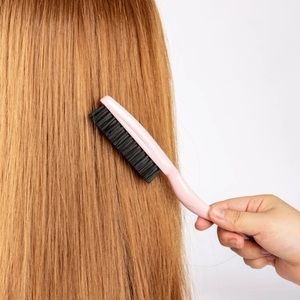 Peigne à cheveux,encore dans son emballage